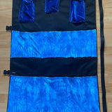 Blue BDSM gear kit bag. Kink storage for floggers, canes, crops, paddles, collar, rope, cuffs, nipple clamps. Transport fetish gear Dom