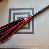 Red and black flogger, adult toy