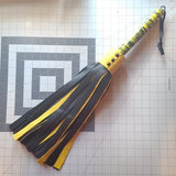 Yellow and black flogger